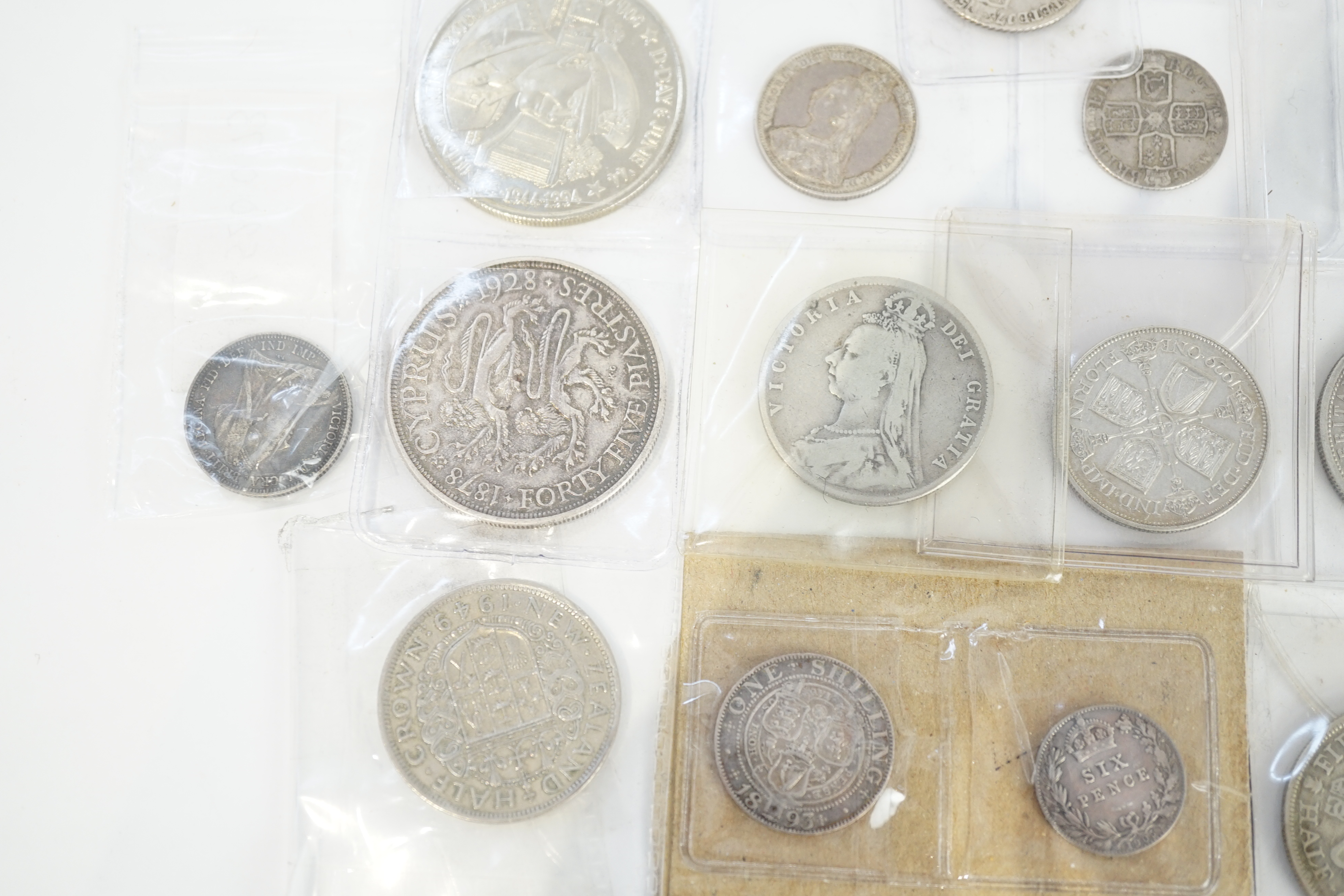 British and British crown dependency coins, 18th-20th century, to include George II shilling, 1758, fine or better, Anne sixpence, five halfcrowns, 1888, good VF, 1887, VF, 1889, 1883 and 1930, two florins, 1887, EF, 192
